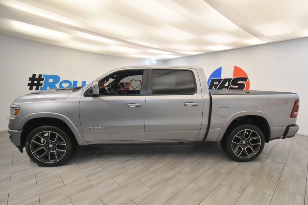 2019 RAM 1500 Laramie 4x4 4dr Crew Cab 5.6 ft. SB Pickup, Silver, Mileage: 131,833 - photo 1