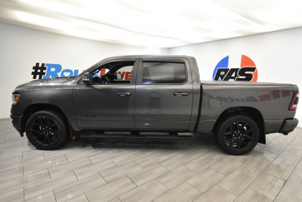 2020 RAM 1500 Rebel 4x4 4dr Crew Cab 5.6 ft. SB Pickup, Gray, Mileage: 64,636 - photo 1