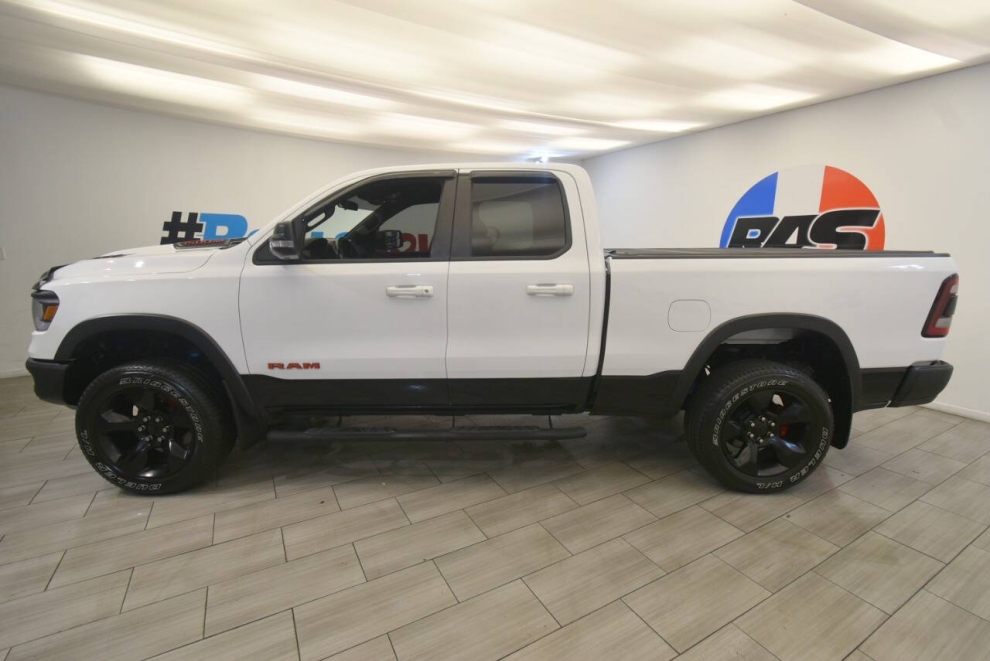 2019 RAM 1500 Rebel 4x4 4dr Quad Cab 6.4 ft. SB Pickup, Blanco, Mileage: 103,430 - photo 1