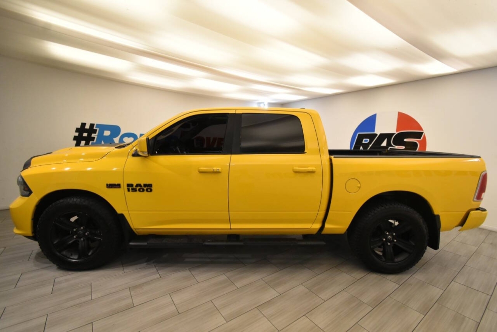 2016 RAM 1500 Sport 4x4 4dr Crew Cab 5.5 ft. SB Pickup, Yellow, Mileage: 97,278 - photo 1
