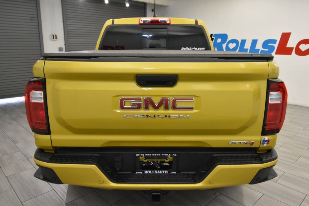 2023 GMC Canyon AT4 4x4 4dr Crew Cab 5 ft. SB, Yellow, Mileage: 56,673 - photo 3