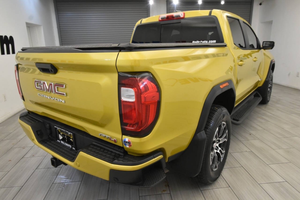 2023 GMC Canyon AT4 4x4 4dr Crew Cab 5 ft. SB, Yellow, Mileage: 56,673 - photo 4